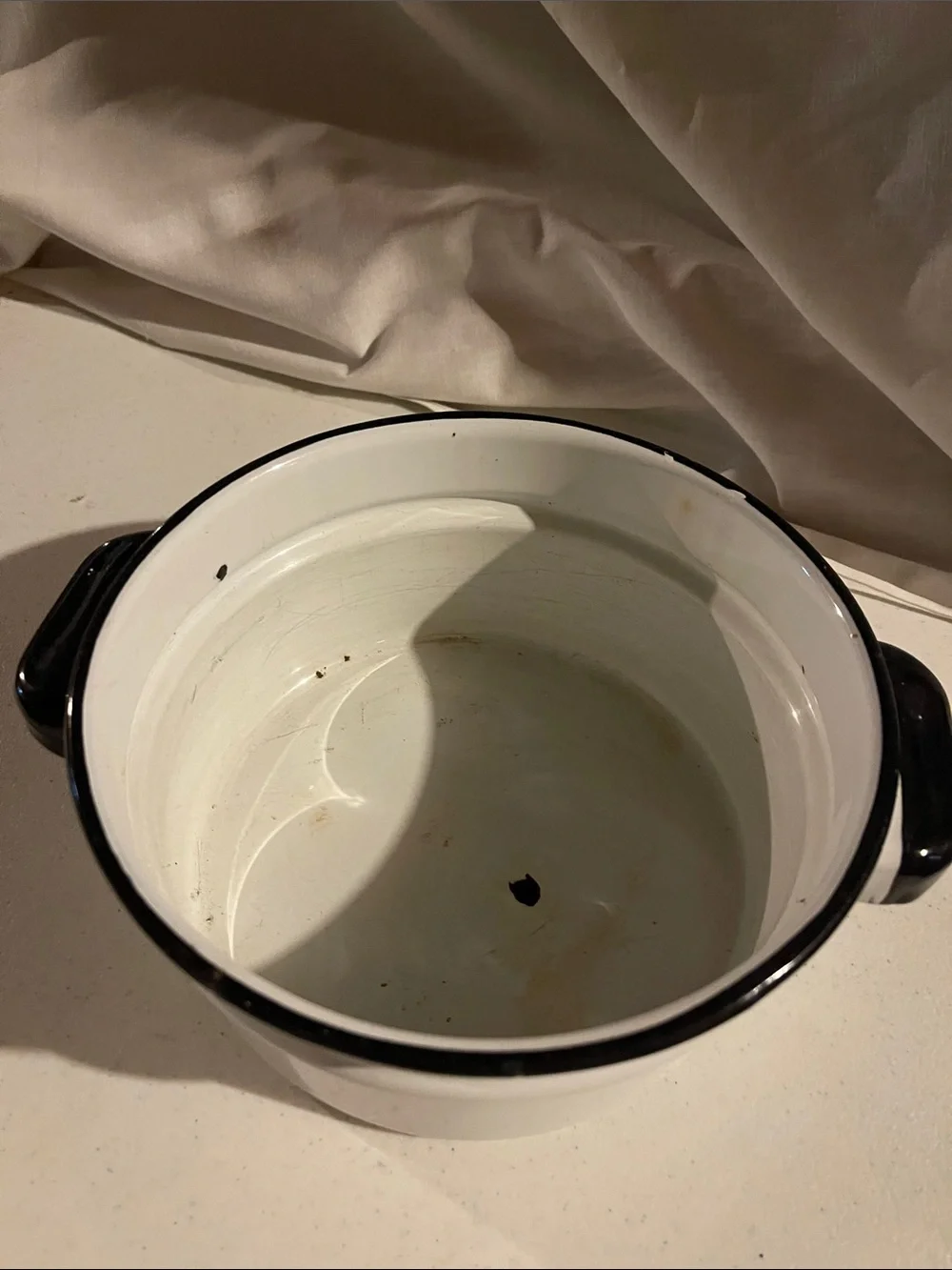 Antique White Enamel Serving Bowl with Black Rim